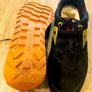 Men’s black and gold sneakers